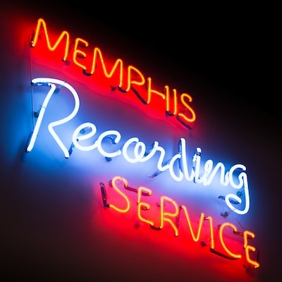 neon sign in white and red that says Memphis recording service a.s.u.